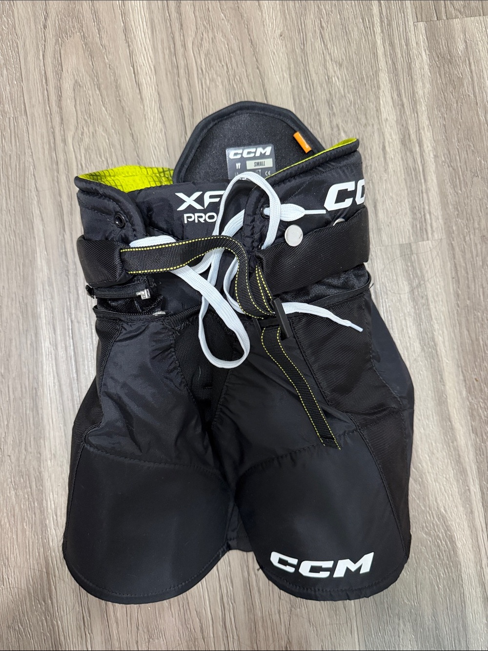 CCM Black Hockey Pants with Neon Yellow Accents